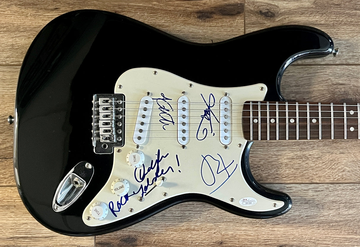 The B-52's full group signed "Rock Lobster" Fender guitar