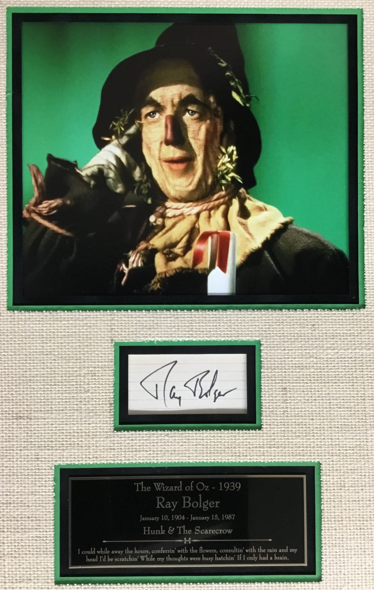Ray Bolger signed cut