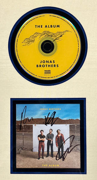 The Jonas Brothers signed CD insert